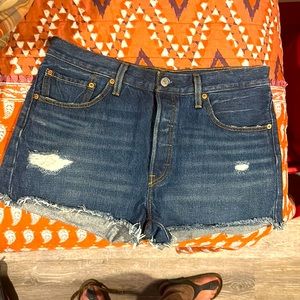 Super cute Levi’s jean shorts. Throw on boots and you are looking hot!
